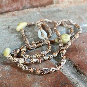 Long puka shell necklace